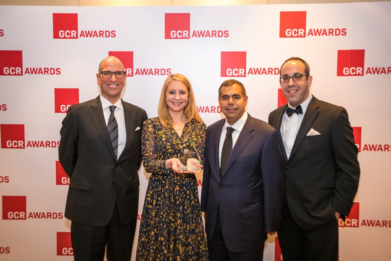 Blakes team members holding award
