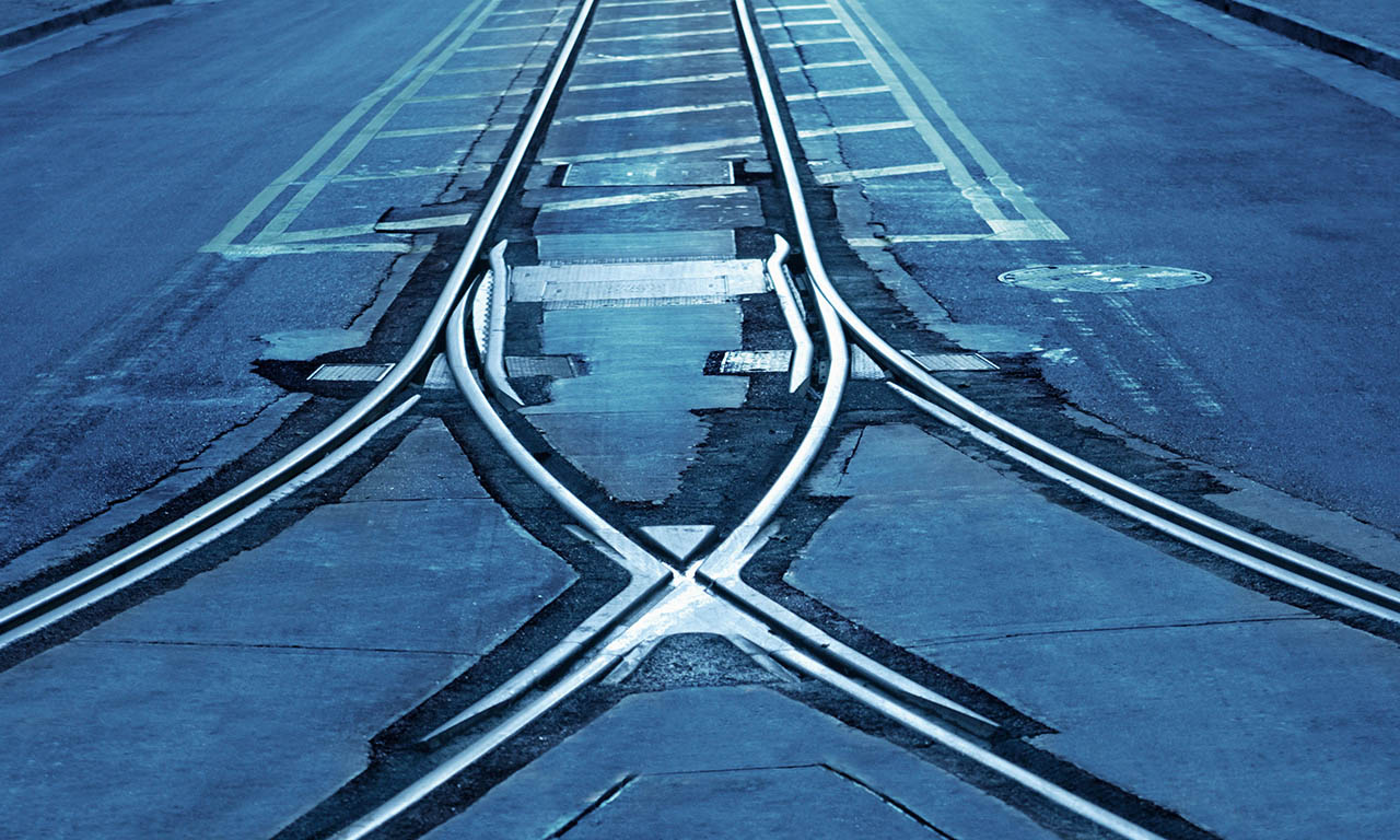 Railway crossing, a metaphor for mergers and acquisitions